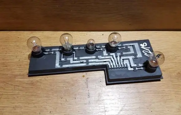 Tail light bulb cover holder