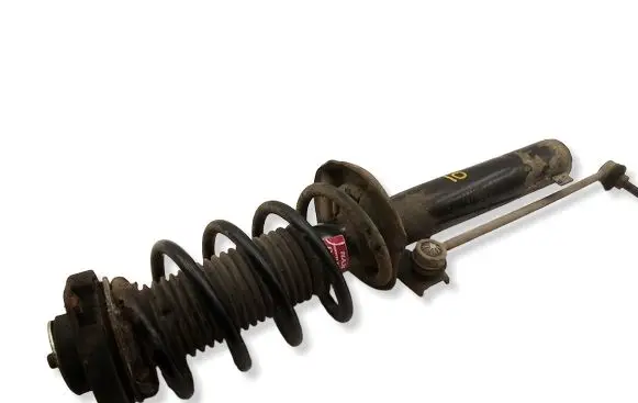 Volkswagen PASSAT B6 Front shock absorber/damper 335808