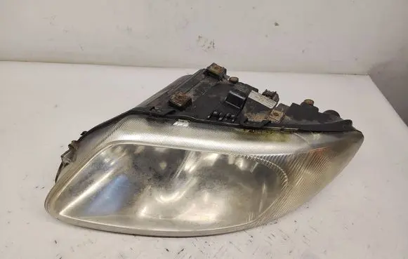Chrysler Voyager Headlight/headlamp 04857703AB