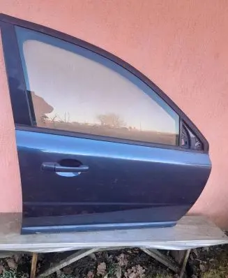 Volvo V70 Front door 43R001106 E000186 DOT57M53AS2