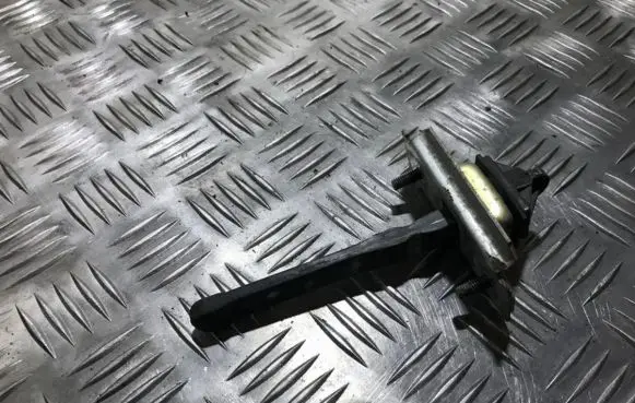 Mazda 323 F Front door check strap stopper 