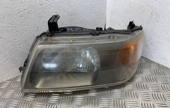 Mitsubishi Pajero Sport I Headlight/headlamp 10087415