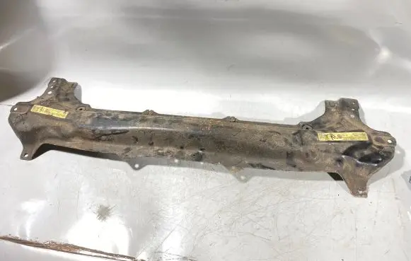 Top upper radiator support slam panel