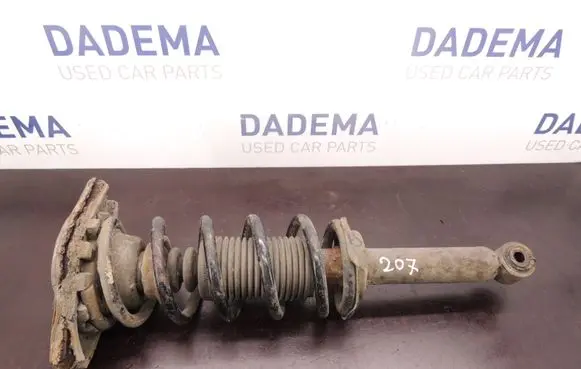 Nissan Almera N16 Rear shock absorber with coil spring D207