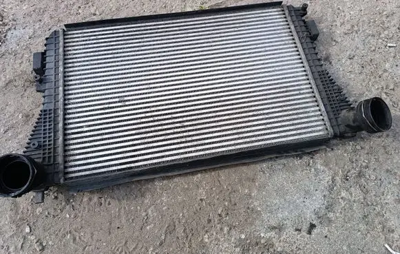 Volkswagen Golf V Intercooler radiator 1K0145803L