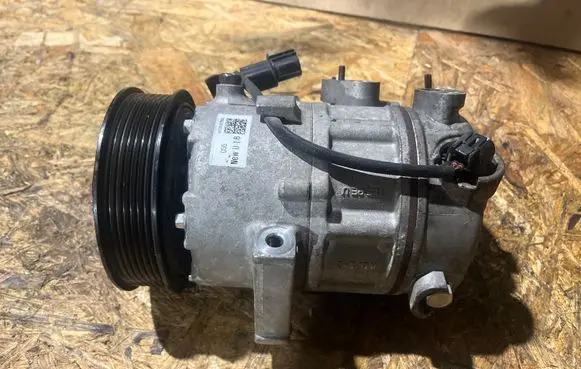 KIA Sportage Air conditioning (A/C) compressor (pump) 97701D7550