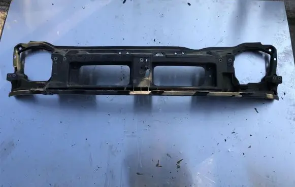 Radiator support slam panel
