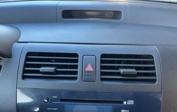 Suzuki Swift I Dash center air vent grill 
