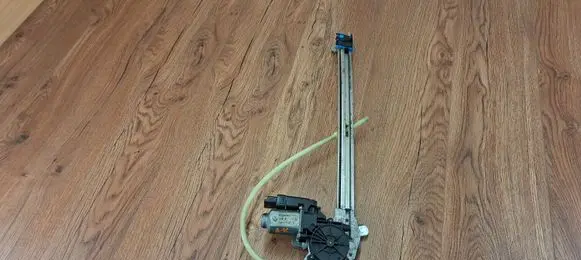 Rear door window regulator with motor