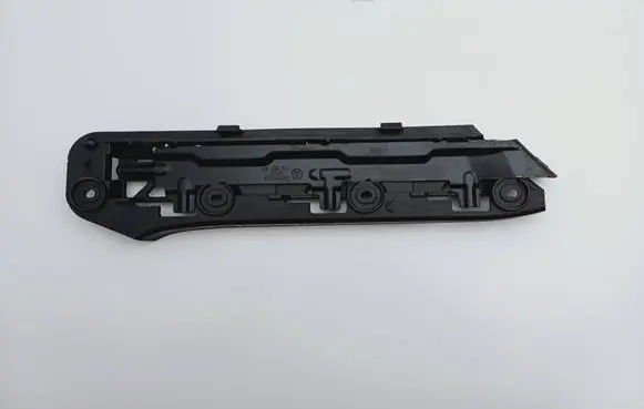 Volkswagen Touran I Front bumper mounting bracket 1T0807935 1T0807049