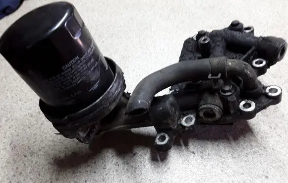 Subaru Outback Oil filter mounting bracket