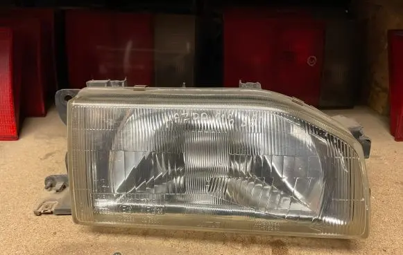 Mazda 323 Headlight/headlamp 11061528R 11061247