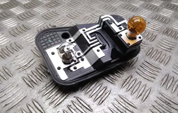 Volkswagen Touareg I Tail light bulb cover holder 7L6945257 28252102