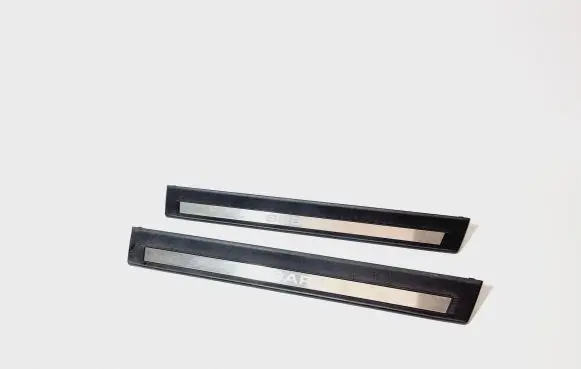 Subaru Legacy sill trim set (inner) 94060AJ060
