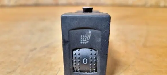 Seat heating switch