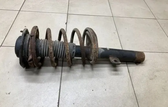 Peugeot Partner Front shock absorber with coil spring