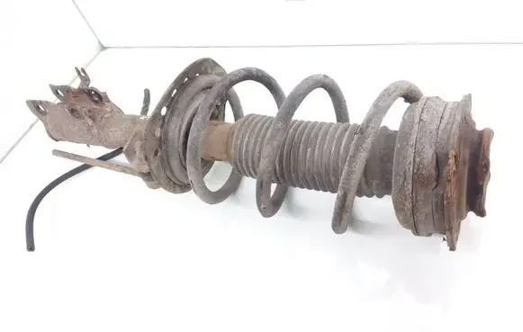 Nissan X-Trail T31 Front shock absorber with coil spring