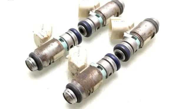 Volkswagen Golf V Fuel injectors set 036031AC IWP163 0985A