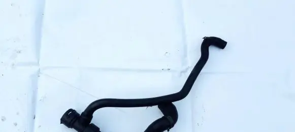 Volkswagen PASSAT B5 Engine coolant pipe/hose 8d0121055f