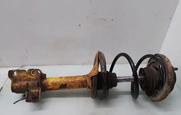 Nissan X-Trail T30 Front shock absorber with coil spring