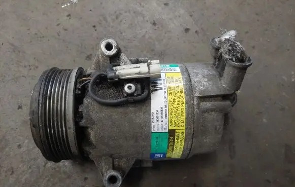 Opel Zafira B Air conditioning (A/C) compressor (pump) 13124752