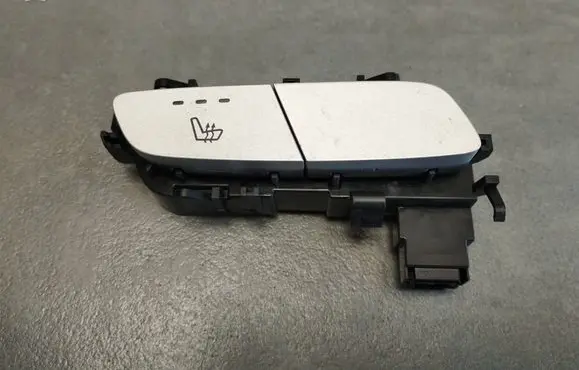 Seat heating switch