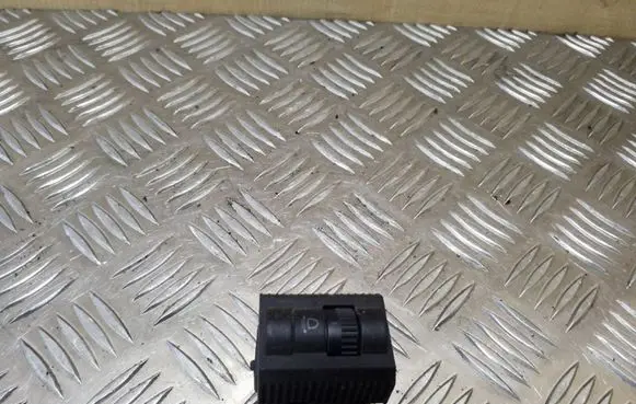 Headlight level height control switch