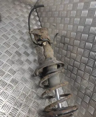 Front shock absorber with coil spring