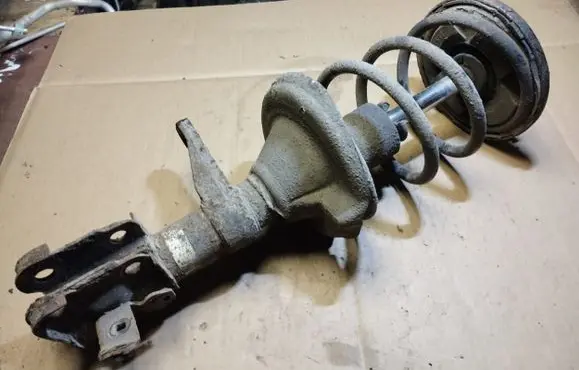 Honda FR-V Front shock absorber with coil spring