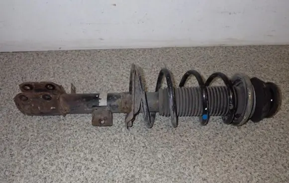 Suzuki SX4 Front shock absorber with coil spring