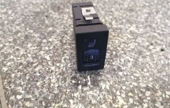 Seat heating switch