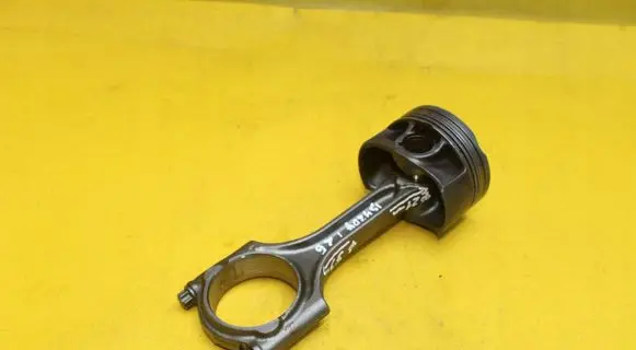 Piston with connecting rod