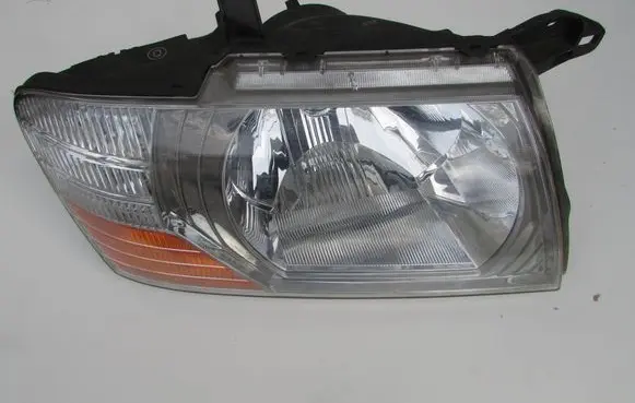 Mitsubishi Pajero Headlight/headlamp 10087420