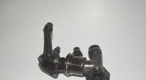 Thermostat/thermostat housing