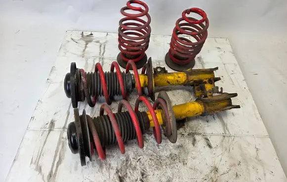 Saab 9-3 Ver2 Set of springs and shock absorbers (Front and rear) 482019