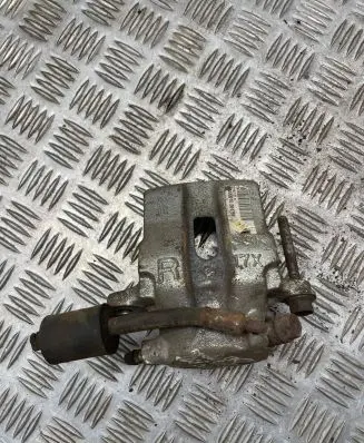 Suzuki Grand Vitara I Front brake caliper