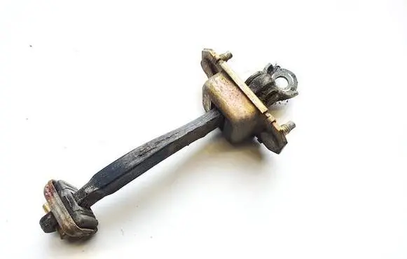 Rear door check strap stopper