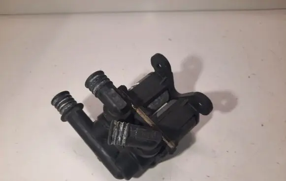 Coolant heater control valve