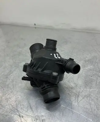 Thermostat/thermostat housing