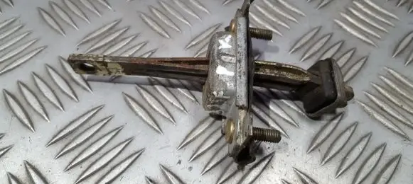 Front door check strap stopper
