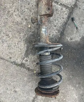 Front shock absorber/damper