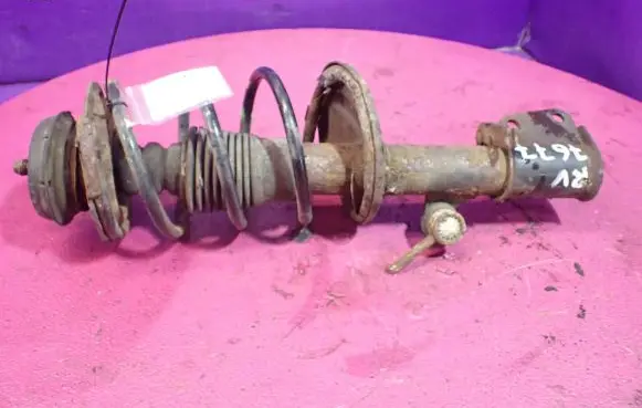 Front shock absorber with coil spring