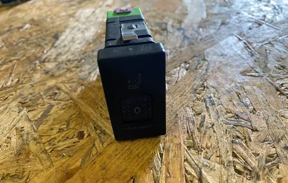 Seat heating switch