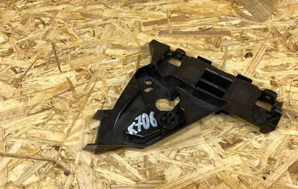 Opel Astra J Front bumper mounting bracket 13350884