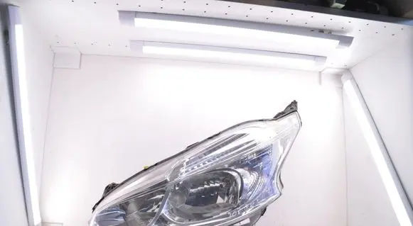 Peugeot 208 I Headlight/headlamp 9802221880