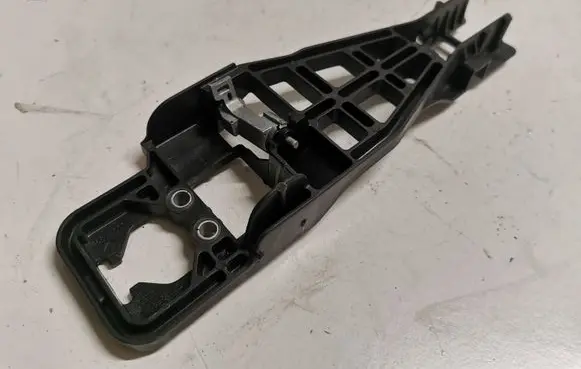 Rear door exterior handle/bracket