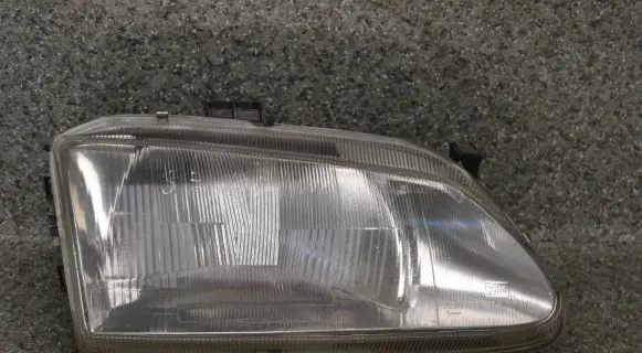 Renault Scenic I Headlight/headlamp 7701672735