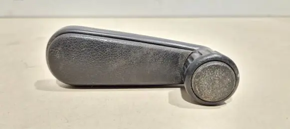 Volkswagen Golf II Rear door window winding handle 191837579