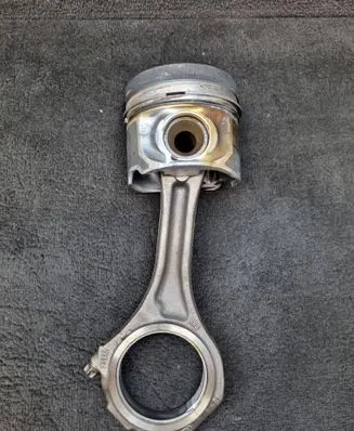 Piston with connecting rod