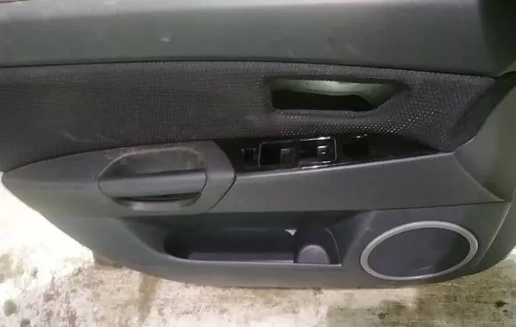 Mazda 3 I Front door card panel trim
